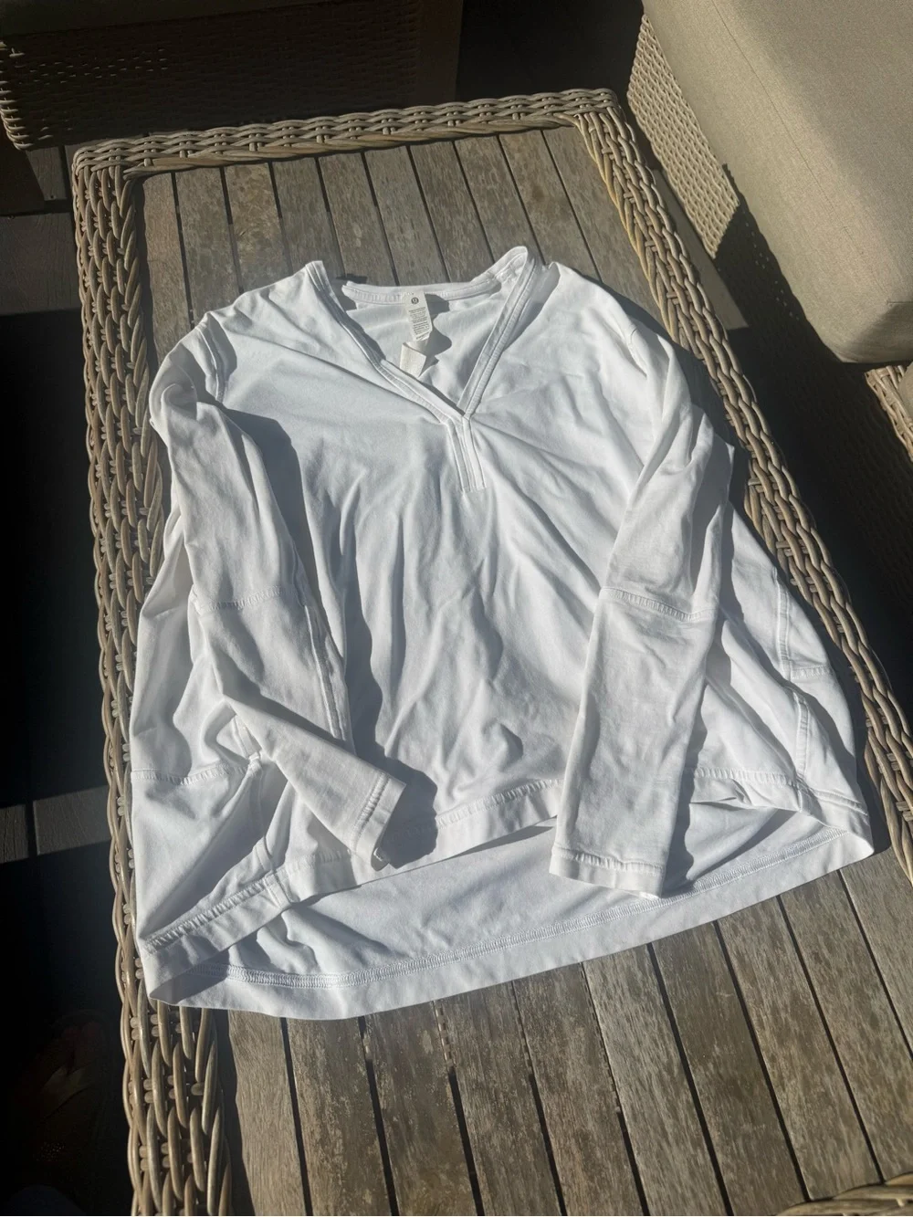 lululemon athletica White Long Sleeve V-Neck Top back in action , size 2